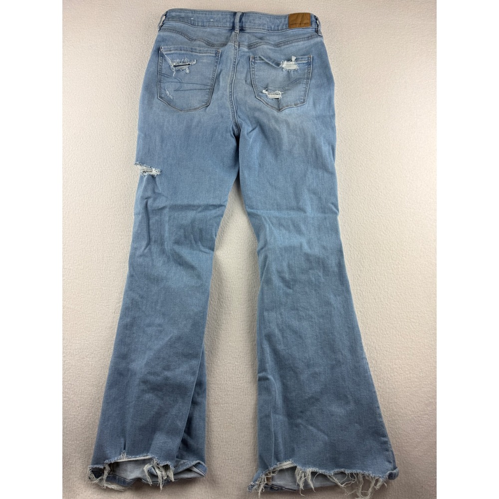 American Eagle Super Hi-Rise Flare Jeans Womens 10 Light Wash Distressed Raw Hem - Picture 2 of 10